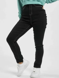 Hosen & Jeans*Missguided Mg X Assets Sinner Enge Jeans mit Kontrastnähten in Schwarz