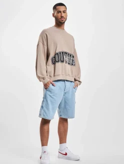 Pullover & Sweater*The Couture Club  Sweatshirt mit Rundhalsausschnitt und Puff-Print in Beige