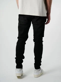 Jeans & Hosen*UNEFFECTED Premium Ripped Slim Fit Jeans schwarz
