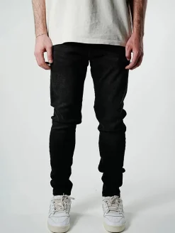 Jeans & Hosen*UNEFFECTED Premium Ripped Slim Fit Jeans schwarz